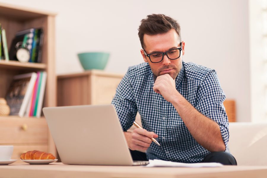 A man working at a laptop